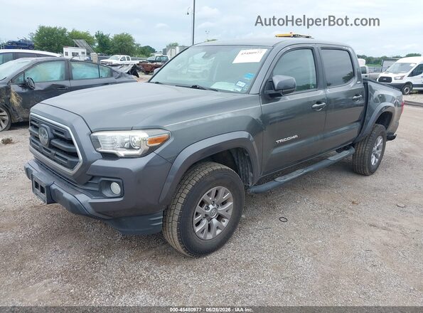 3TMAZ5CN9JM053440 2018 TOYOTA TACOMA Gray Vista tres cuartos delantera izquierda