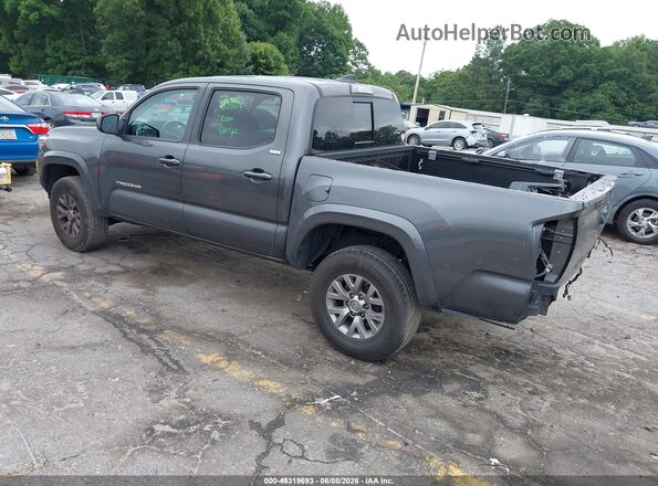 3TMAZ5CN9JM074255 2018 TOYOTA TACOMA Gray Trasero izquierdo
