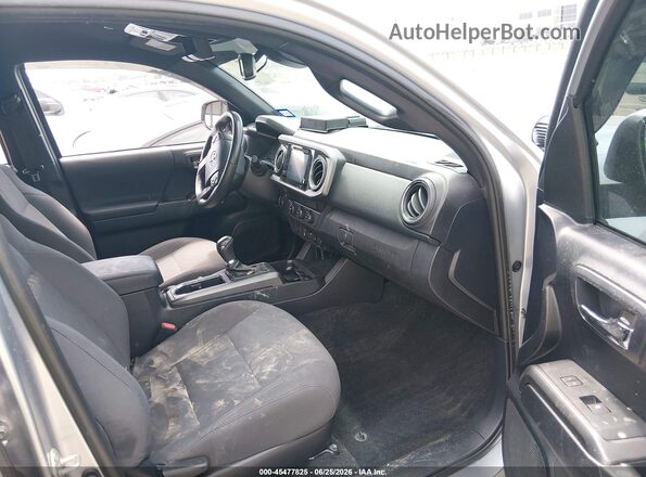 3TMAZ5CN9KM113122 2019 TOYOTA TACOMA Silver წინა სალონის ხედი