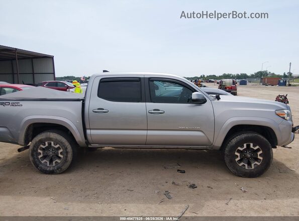 3TMAZ5CN9KM113122 2019 TOYOTA TACOMA Silver უკანა სალონის ხედი
