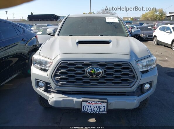 3TMAZ5CN9MM153087 2021 TOYOTA TACOMA Gray Вид задньої частини салону