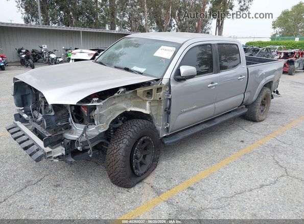 3TMBZ5DN7JM012422 2018 TOYOTA TACOMA Silver Vista tres cuartos delantera izquierda