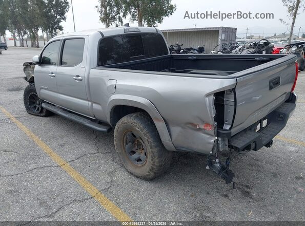 3TMBZ5DN7JM012422 2018 TOYOTA TACOMA Silver Trasero izquierdo