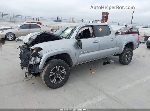 3TMBZ5DN8JM014518 2018 TOYOTA TACOMA Silver Առջևի ձախ երեք քառորդ տեսարան