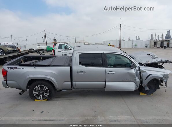 3TMBZ5DN8JM014518 2018 TOYOTA TACOMA Silver Սալոնի հետևի տեսք