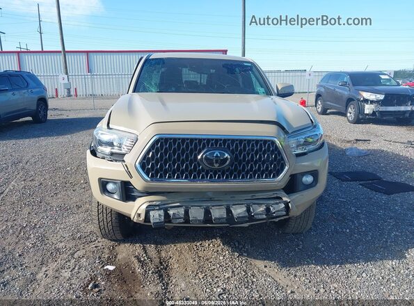 3TMCZ5AN0KM247478 2019 TOYOTA TACOMA Tan Widok wnętrza z tyłu