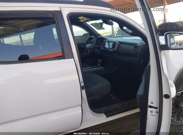 3TMCZ5AN0KM262062 2019 TOYOTA TACOMA White წინა სალონის ხედი