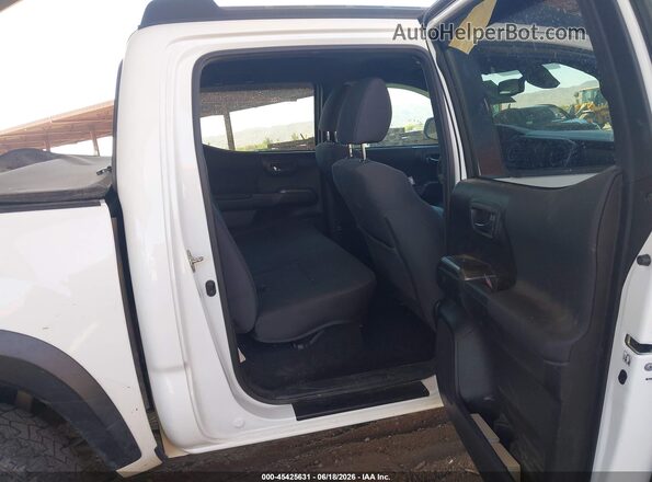 3TMCZ5AN0KM262062 2019 TOYOTA TACOMA White VIN კოდის სტიკერის ხედი