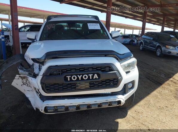 3TMCZ5AN0KM262062 2019 TOYOTA TACOMA White ხელსაწყოთა პანელის ხედი