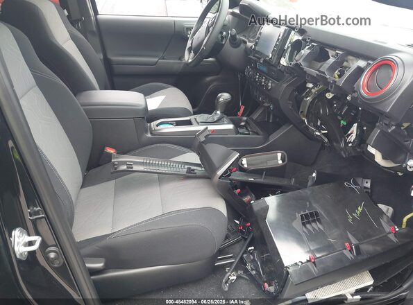 3TMCZ5AN0PM651288 2023 TOYOTA TACOMA Black Widok wnętrza z przodu