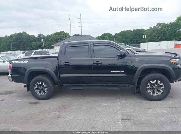 3TMCZ5AN0PM651288 2023 TOYOTA TACOMA Black Widok wnętrza z tyłu