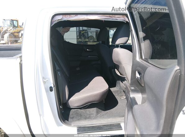 3TMCZ5AN1KM220208 2019 TOYOTA TACOMA White VIN կոդի պիտակի տեսք