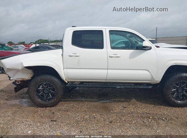 3TMCZ5AN2PM543772 2023 TOYOTA TACOMA White Widok wnętrza z tyłu