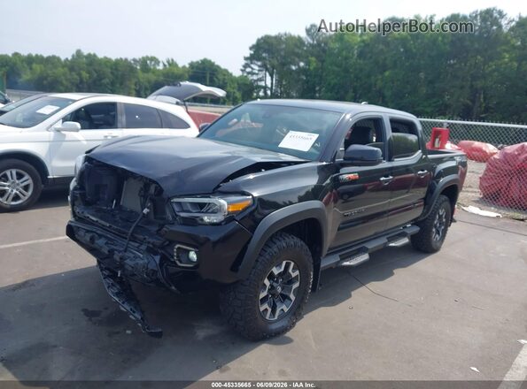 3TMCZ5AN2PM565772 2023 TOYOTA TACOMA Black Vista tres cuartos delantera izquierda