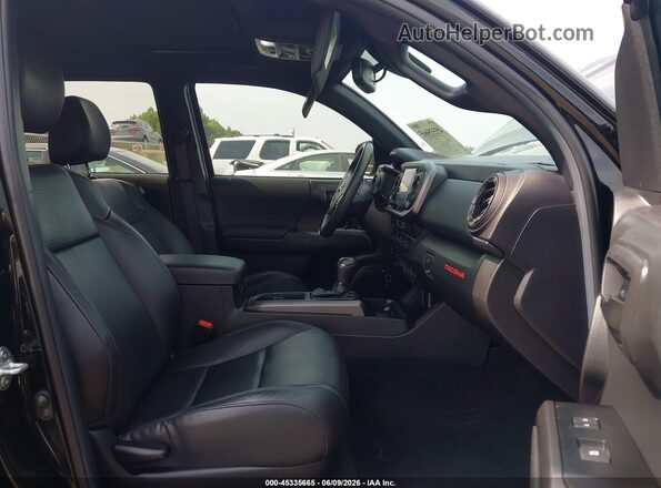 3TMCZ5AN2PM565772 2023 TOYOTA TACOMA Black Vista interior delantera