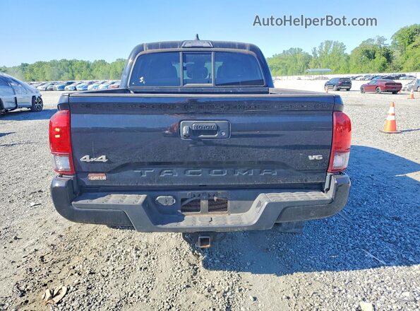 3TMCZ5AN2PM585178 2023 TOYOTA TACOMA Black Vista trasera