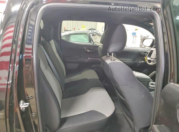 3TMCZ5AN2PM587769 2023 TOYOTA TACOMA Black Vista de los asientos traseros