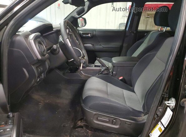 3TMCZ5AN2PM587769 2023 TOYOTA TACOMA Black Vista interior delantera