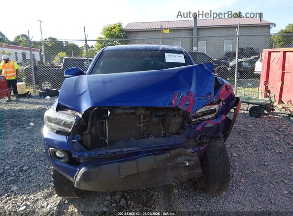 3TMCZ5AN2PM604571 2023 TOYOTA TACOMA Blue Սալոնի հետևի տեսք