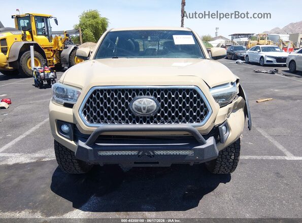 3TMCZ5AN3KM213938 2019 TOYOTA TACOMA Brown Widok wnętrza z tyłu