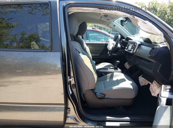 3TMCZ5AN3KM267286 2019 TOYOTA TACOMA Gray Widok wnętrza z przodu
