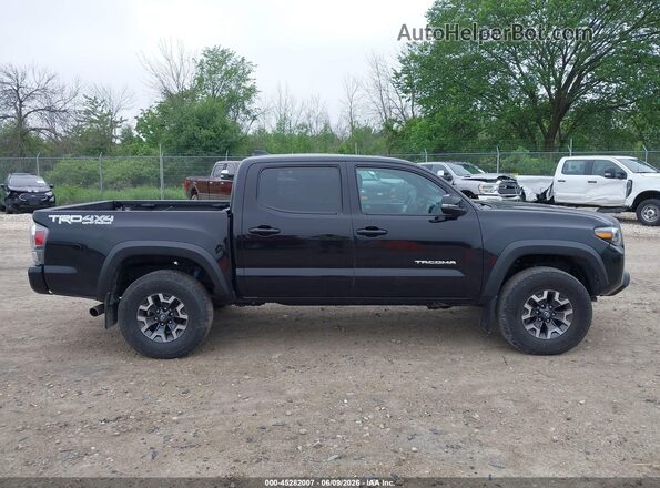 3TMCZ5AN3PM597579 2023 TOYOTA TACOMA Black Вид задньої частини салону