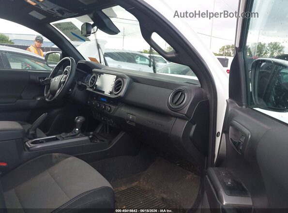 3TMCZ5AN3PM604854 2023 TOYOTA TACOMA White Widok wnętrza z przodu