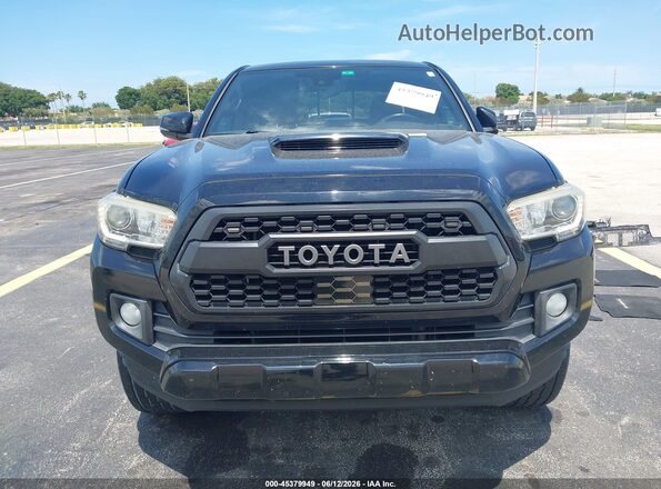 3TMCZ5AN4JM162352 2018 TOYOTA TACOMA Black Սալոնի հետևի տեսք