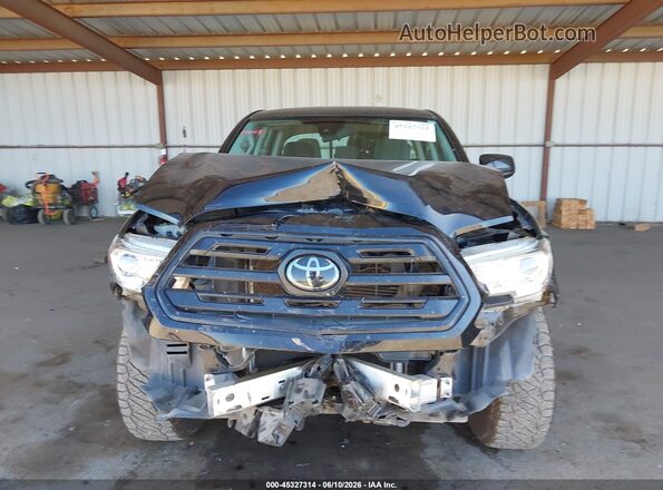 3TMCZ5AN4JM169656 2018 TOYOTA TACOMA Black უკანა სალონის ხედი