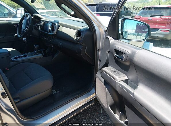 3TMCZ5AN4KM197622 2019 TOYOTA TACOMA Silver წინა სალონის ხედი