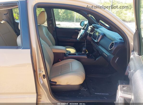 3TMCZ5AN4KM216623 2019 TOYOTA TACOMA Tan Вид салону спереду