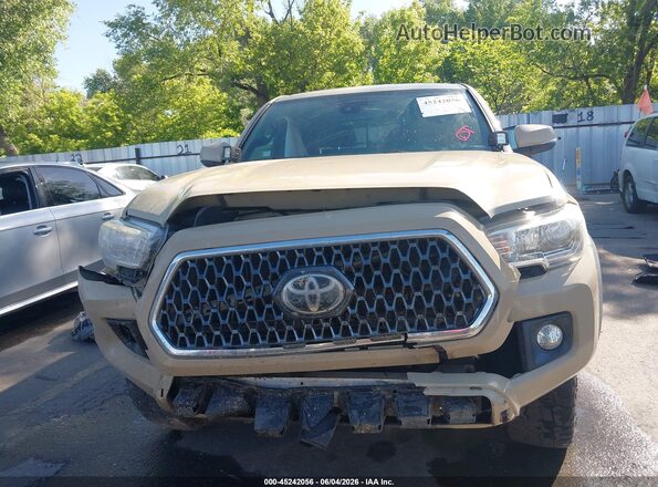 3TMCZ5AN4KM246303 2019 TOYOTA TACOMA Beige Widok wnętrza z tyłu