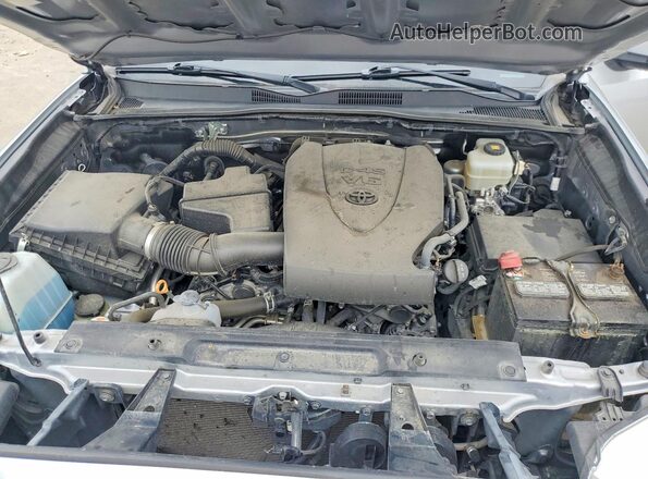 3TMCZ5AN4KM285179 2019 TOYOTA TACOMA Silver Rear interior view