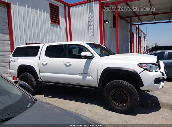 3TMCZ5AN4MM397144 2021 TOYOTA TACOMA White Vista interior trasera