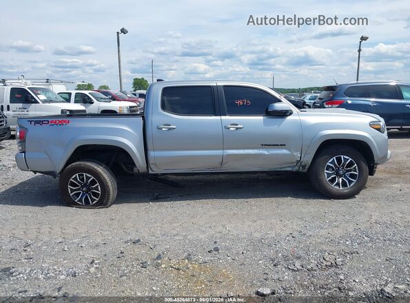 3TMCZ5AN4PM651004 2023 TOYOTA TACOMA Silver Widok wnętrza z tyłu