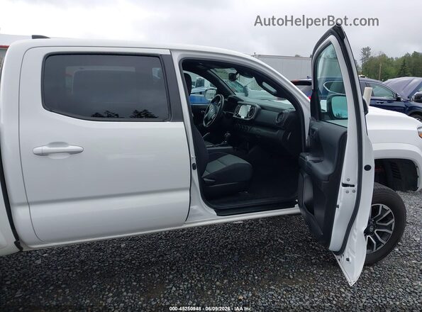 3TMCZ5AN5PM549906 2023 TOYOTA TACOMA White Front interior view