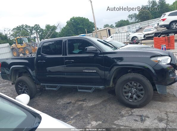 3TMCZ5AN5PM577897 2023 TOYOTA TACOMA Black უკანა სალონის ხედი