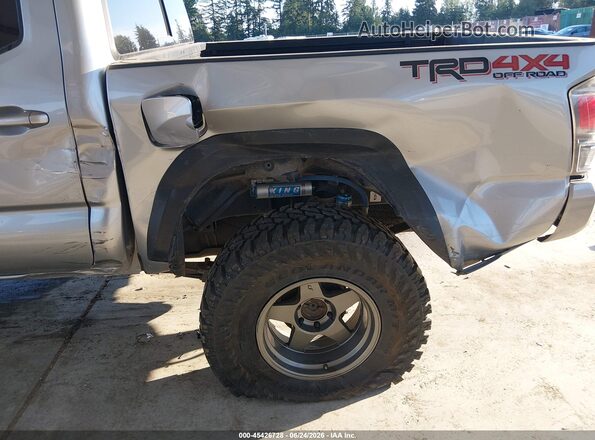 3TMCZ5AN5PM641419 2023 TOYOTA TACOMA Серебряный Вид спереди