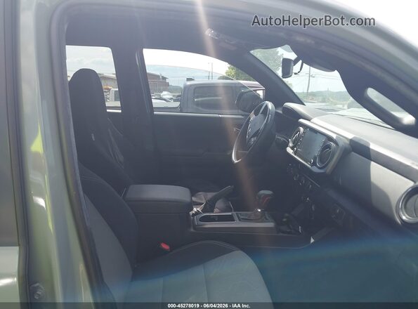 3TMCZ5AN7PM587590 2023 TOYOTA TACOMA Gray Вид салону спереду