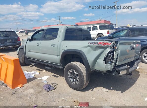 3TMCZ5AN7PM587590 2023 TOYOTA TACOMA Gray Вид задньої частини салону