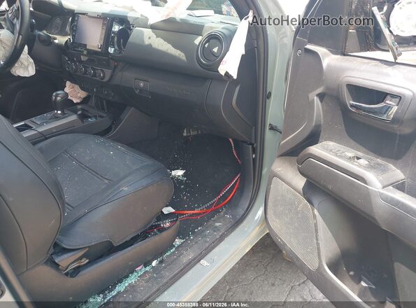3TMCZ5AN7PM602931 2023 TOYOTA TACOMA Gray Front interior view