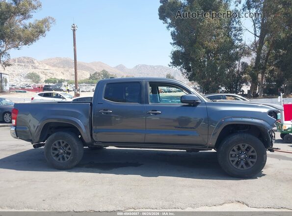 3TMCZ5AN7PM613721 2023 TOYOTA TACOMA Gray Rear interior view