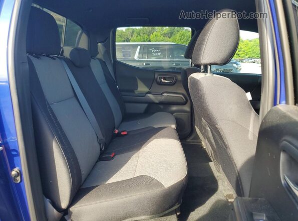 3TMCZ5AN7PM633564 2023 TOYOTA TACOMA Blue Rear seats view
