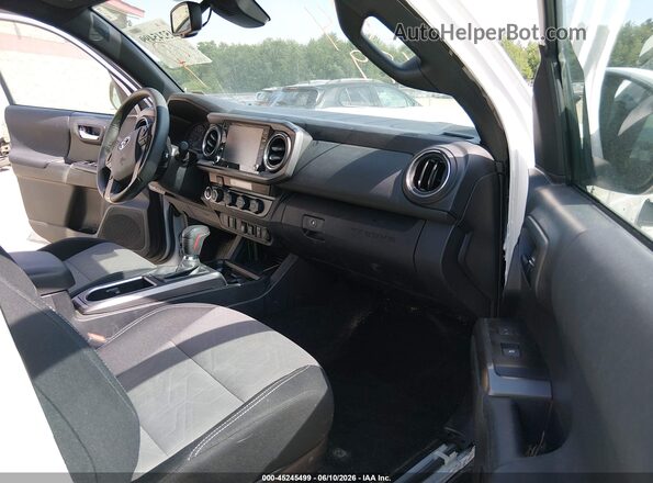 3TMCZ5AN7PM653572 2023 TOYOTA TACOMA White წინა სალონის ხედი