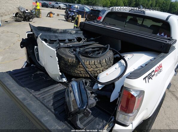 3TMCZ5AN7PM653572 2023 TOYOTA TACOMA White ხელსაწყოთა პანელის ხედი