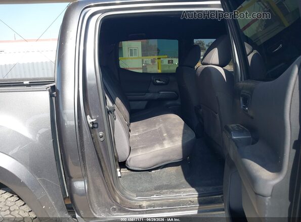 3TMCZ5AN8JM175475 2018 TOYOTA TACOMA Gray VIN կոդի պիտակի տեսք