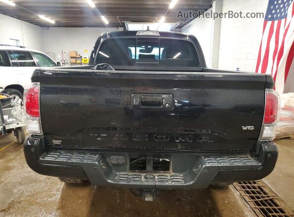 3TMCZ5AN8PM557384 2023 TOYOTA TACOMA Black Rear view