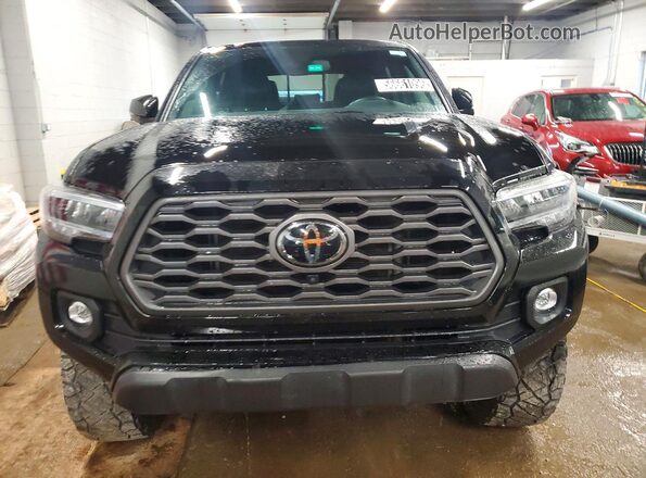3TMCZ5AN8PM557384 2023 TOYOTA TACOMA Black Front view