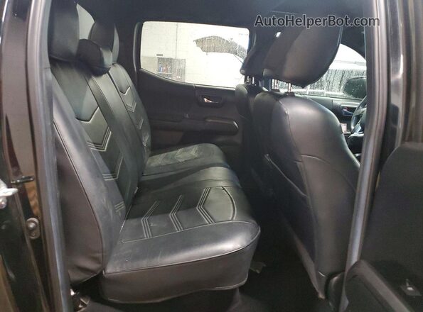 3TMCZ5AN8PM557384 2023 TOYOTA TACOMA Black Rear seats view