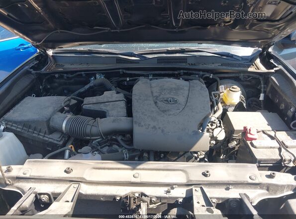 3TMCZ5AN8PM582110 2023 TOYOTA TACOMA Gray Vista trasera